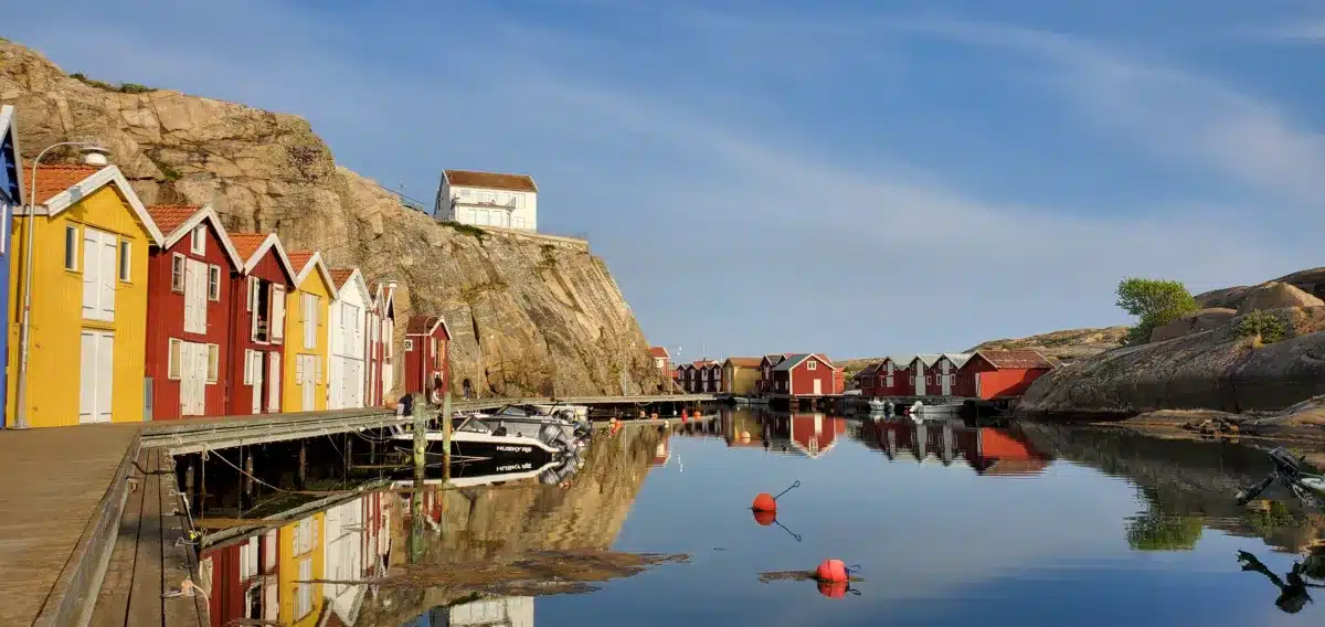 Our road trip in Scandinavia in a converted vehicle: our complete guide Smogen port and colorful houses at sunset